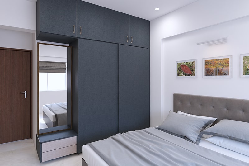 2 door wardrobe design with attached dressing table blends with your bedroom’s interiors