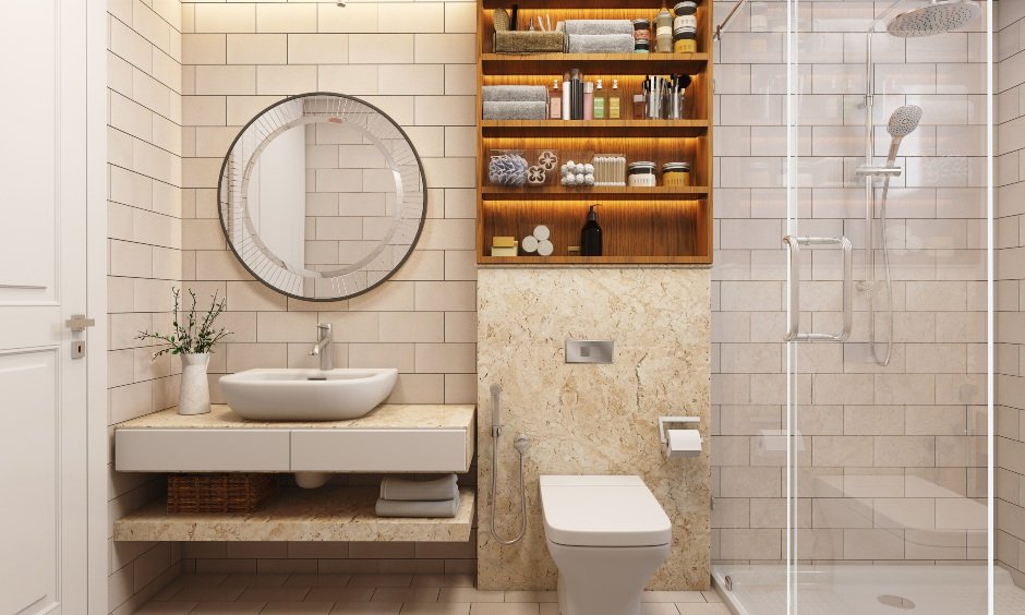 2bhk bathroom partitioned with glass and has a vanity unit with drawers and open shelves