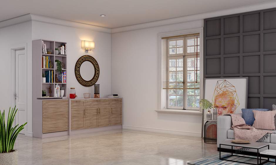 A Dining Room With A Book Shelf Cabinet.