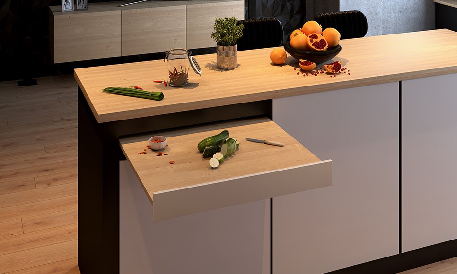 Affordable kitchen island counter design with a chopping board pull-out is a smart way to keep your worktop clean