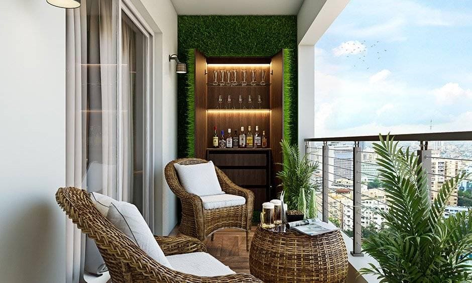 Small balcony design with a hidden bar with a pair of bar stools and pendant lights