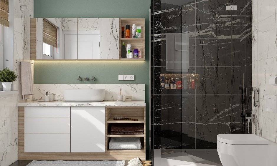 The bathoom is designed with a vanity unit with hidden storage to organise your personal care essentials by home interior designers in chennai