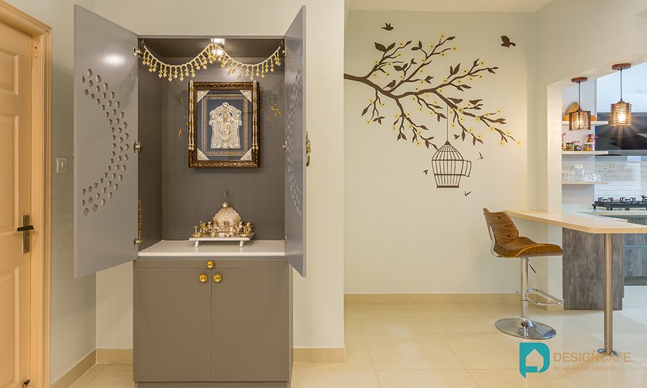Best home interiors in bangalore designed pooja unit in living room