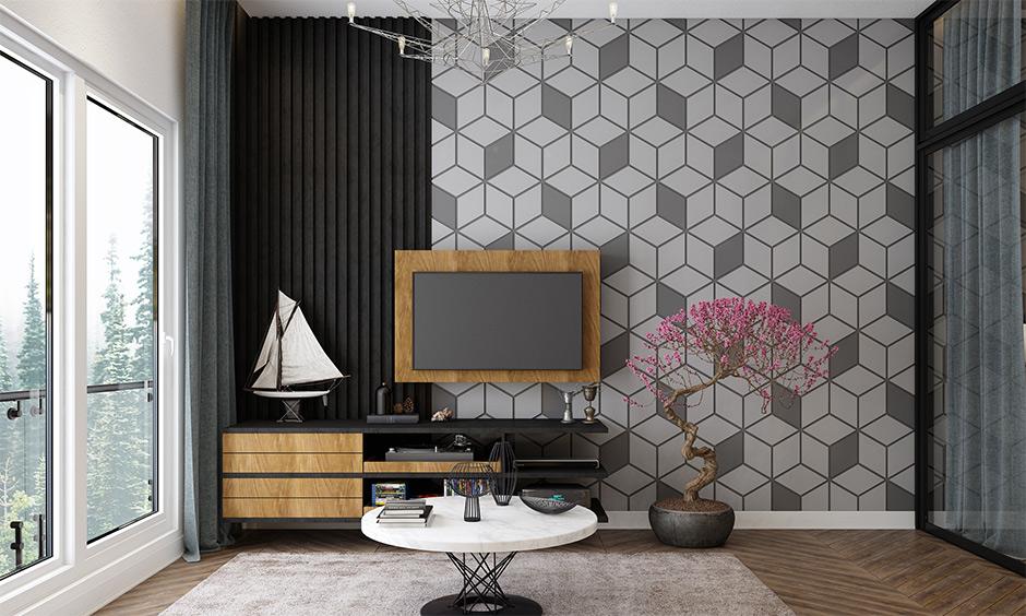 Minimalist living room with bold black accent wall and soft lighting