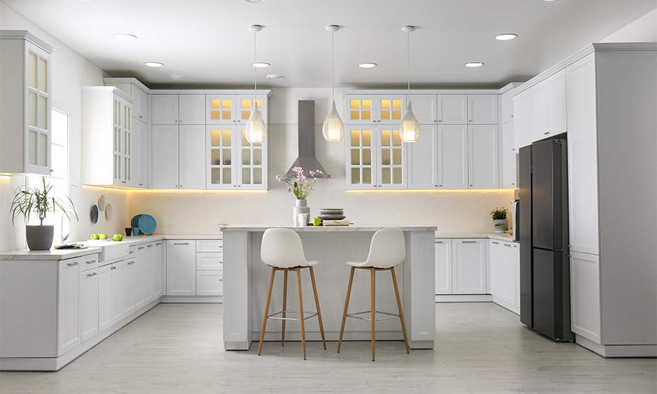 C-shaped kitchen design with ample counter space for cooking and dining.