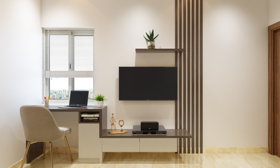 A compact study unit in modern 1bhk interior designed by the window helps you get done with your work