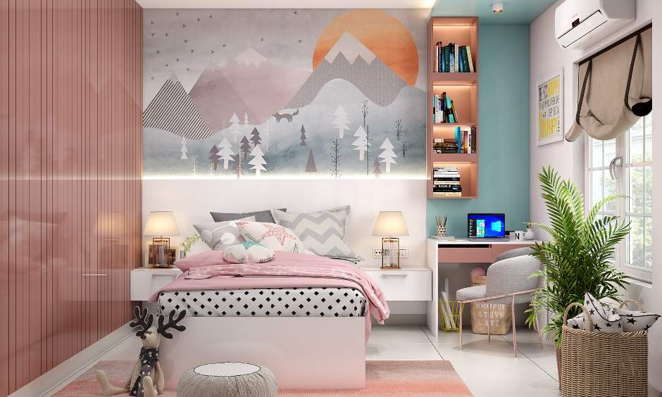 A corner study unit with a desk and a wall-mounted bookshelf in vibrant kids bedroom