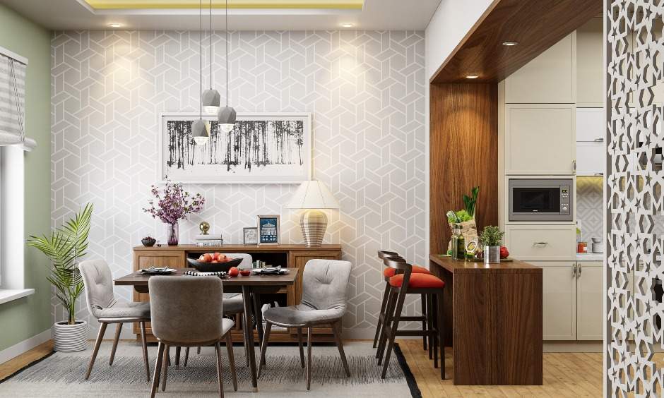 Dining room has a wooden table with four armless cushioned chairs is perfect for Indian homes