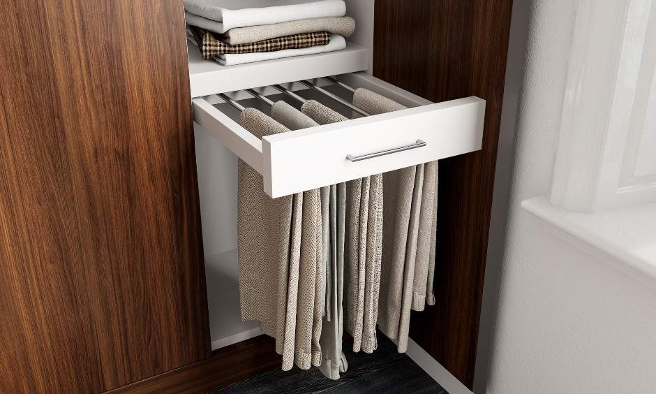 Wardrobe designed with a pull-out trouser hanger