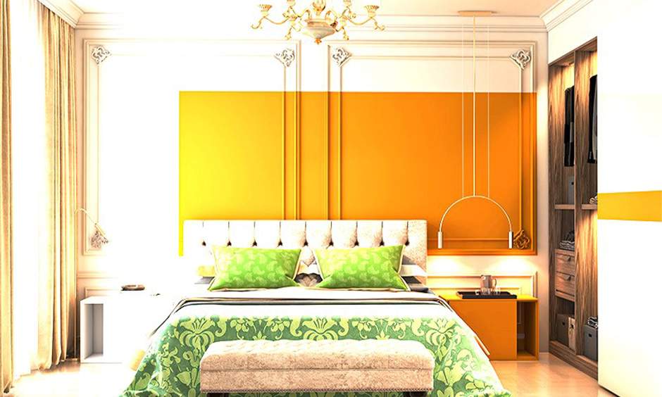 Grey and yellow bedroom with wall panels and modern decor