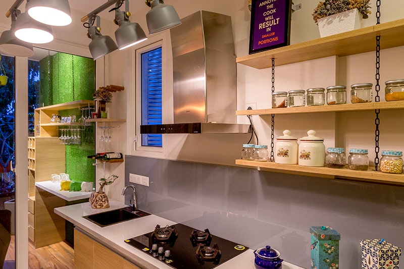 Hanging kitchen shelves bring a whimsical look to your kitchen by using material of wood, glass or metal