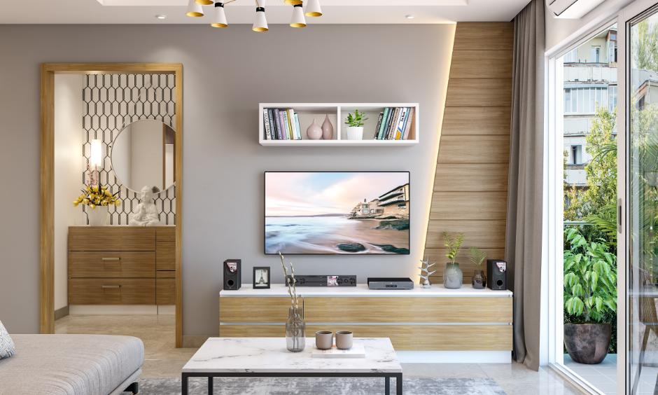 Living room design featuring a TV unit and a wooden panel made with HDHMR sheet for a stylish and durable interior