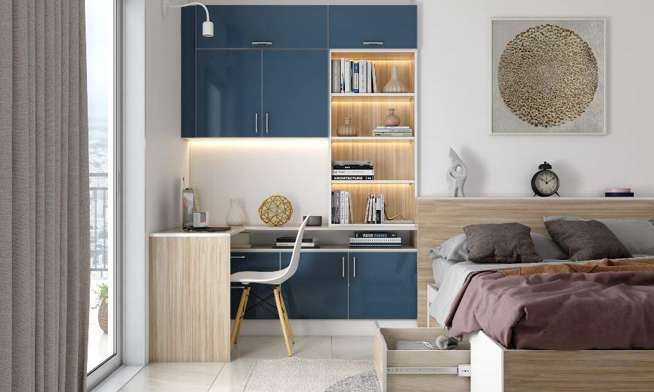Home office design in the bedroom with blue and wooden theme