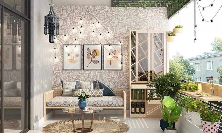 Balcony decorated with warm hanging lights for positive energy