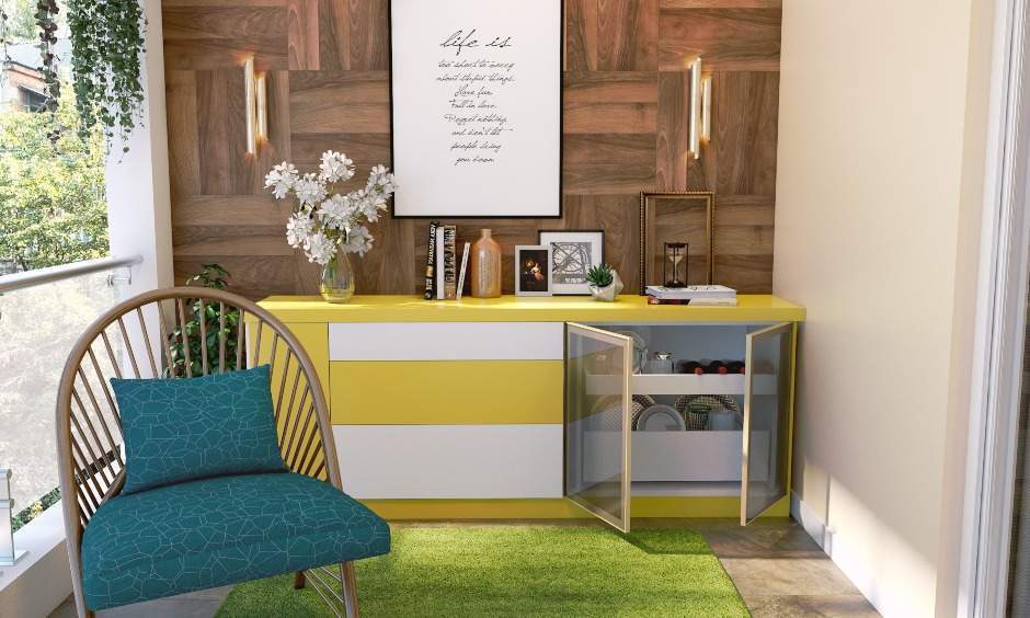 House balcony design where the splashes of green in the potted plants and turfgrass make the space come alive