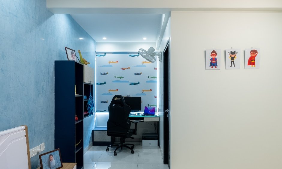 3bhk flat in Whitefield, kid's room features a sleek study space with a tall bookshelf