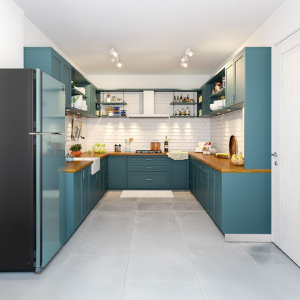 Modern U-shaped kitchen interior design in Hyderabad with sleek cabinets