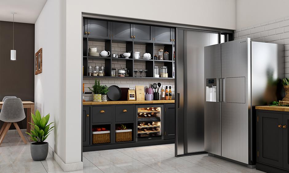 Sliding door separates pantry area from kitchen, maximising style and function.