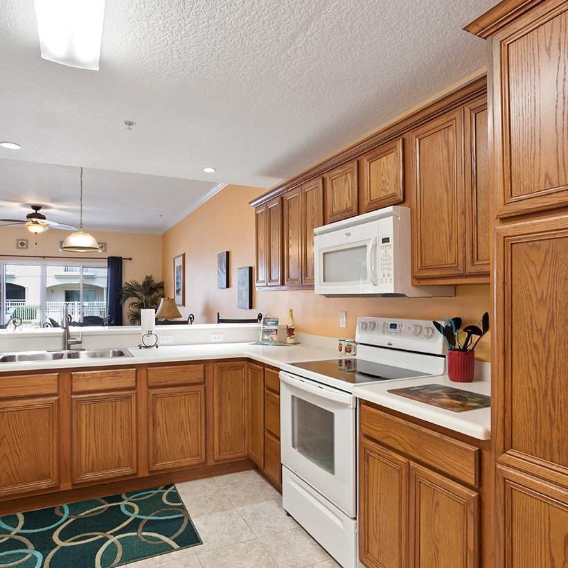 Kitchen storage cabinets which are handleless and with heavy wooden finish for images of wine cabinets