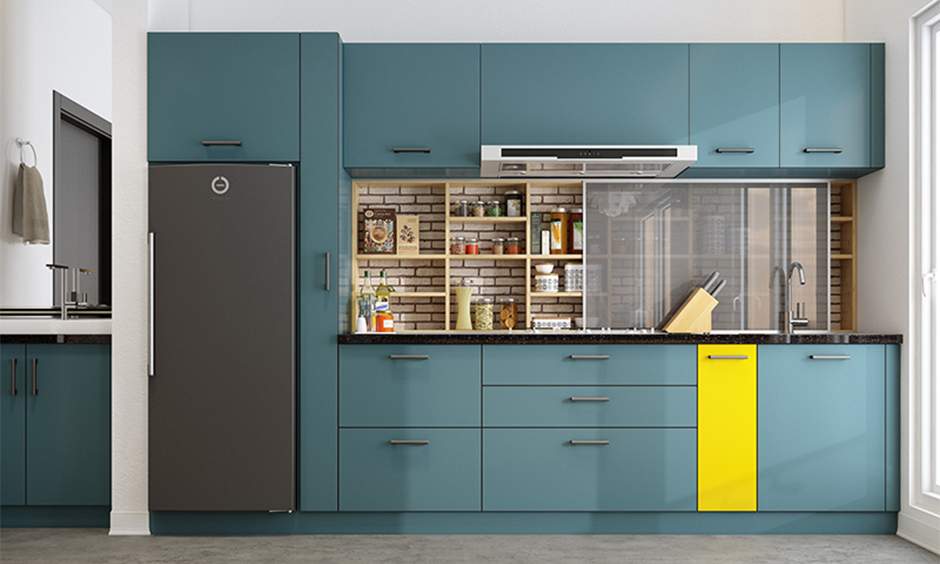 Wooden kitchen storage racks with sliding doors in blue kitchen for a tidy, organised look