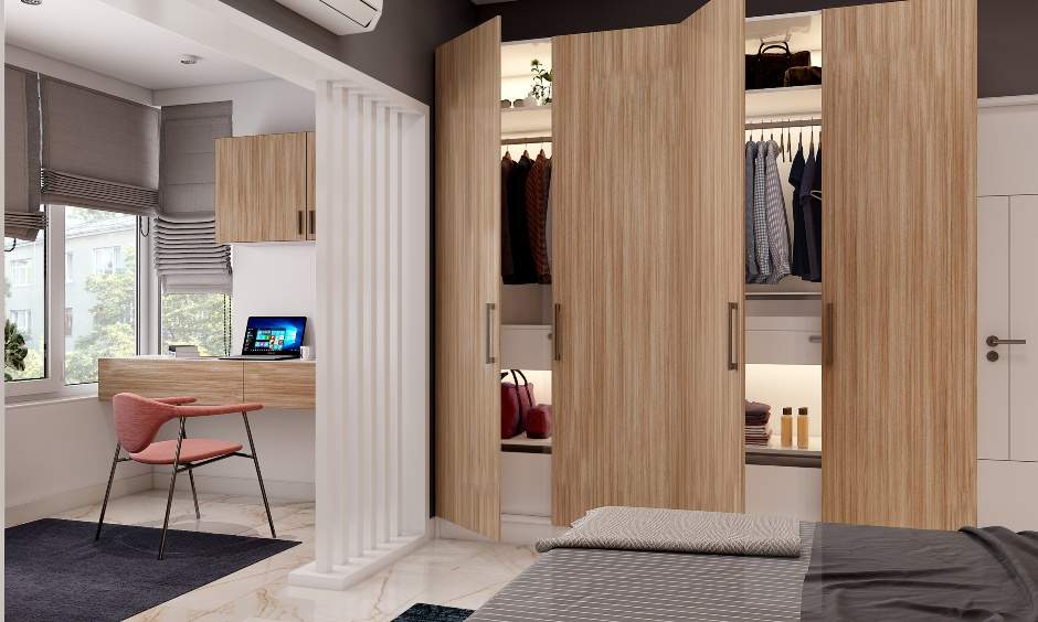 Modern bedroom cum separate study area with a wall-mounted desk and overhead cabinets