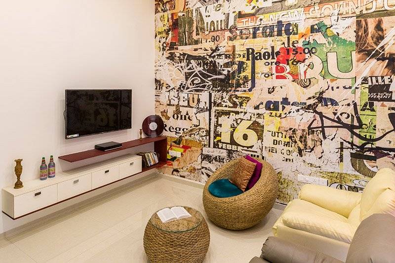 Modern living room furniture ideas with a beautifully designed wall clock and gorgeous hand-stitched cushion for modern living room designs