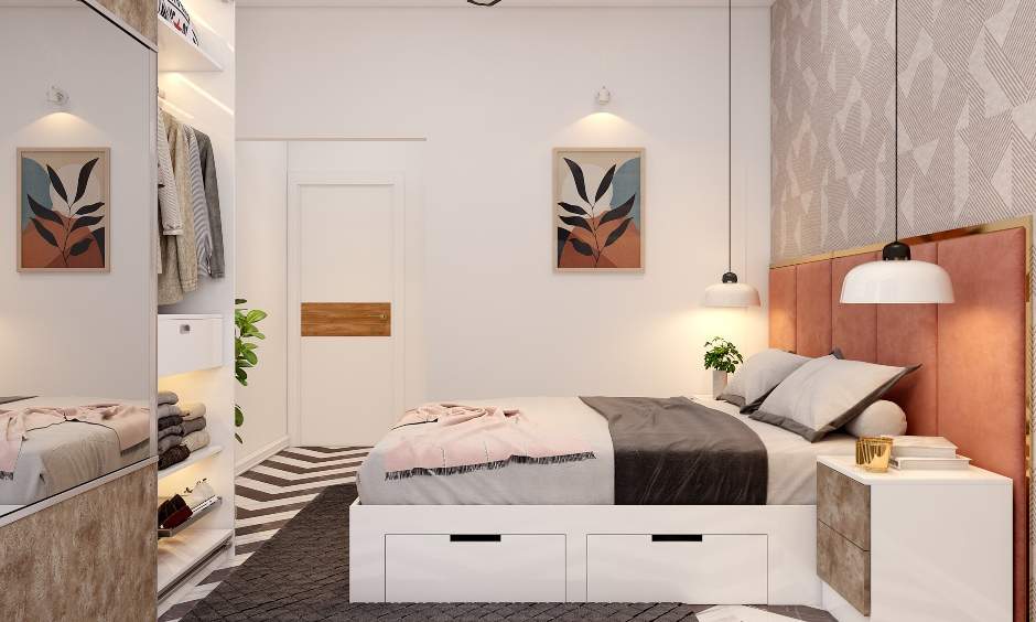 Muted colour modern bedroom features a sliding door wardrobe
