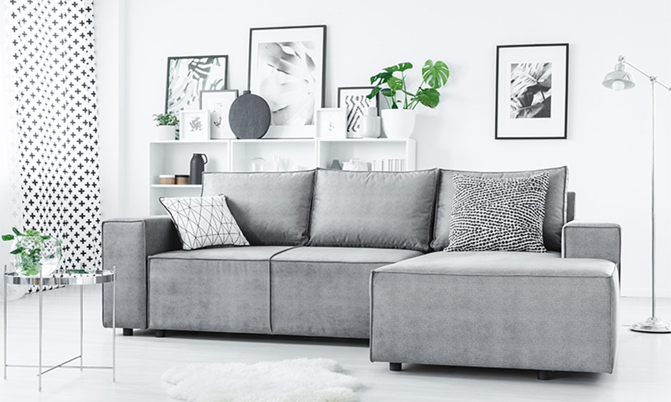 Sleek pet-friendly living room with grey tones, minimalist decor, and easy-to-clean furniture surfaces.