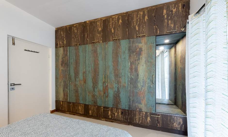 Rustic wardrobe with built-in dressing unit in the third bedroom