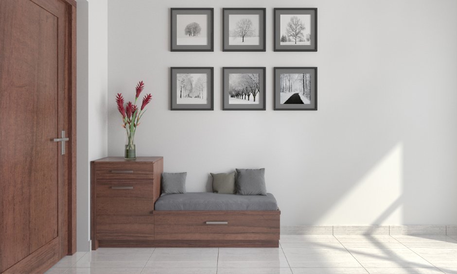 Brown shoe rack with a seating cushion in grey