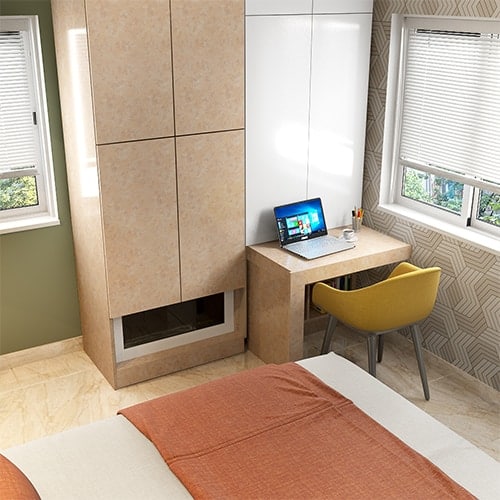 Space saving home interiors Visakhapatnam with a wardrobe pull-out study table