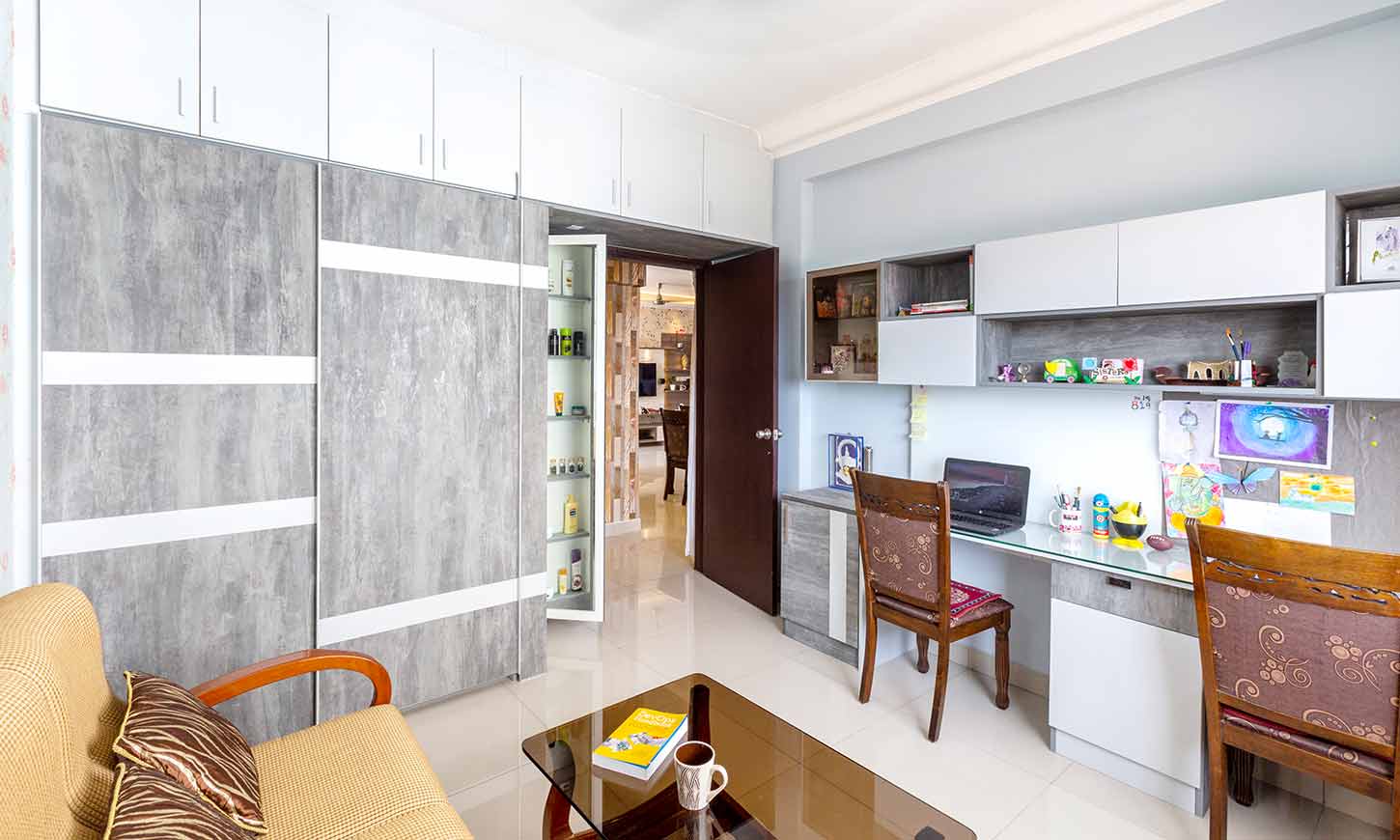 Study table with living area designed by top 10 interior design companies in bangalore