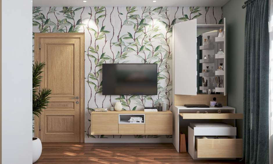 Space saving design for small bedrooms with a tv unit along with hidden dresser done by best space saving designers in bangalore