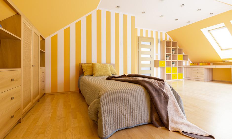 A Fun, irregularly shaped bedroom interior design, which is vibrant