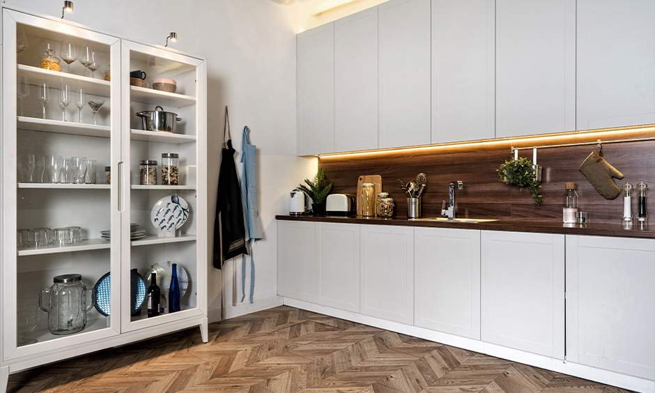 Vintage glass crockery cabinet which is a combination of modern and traditional