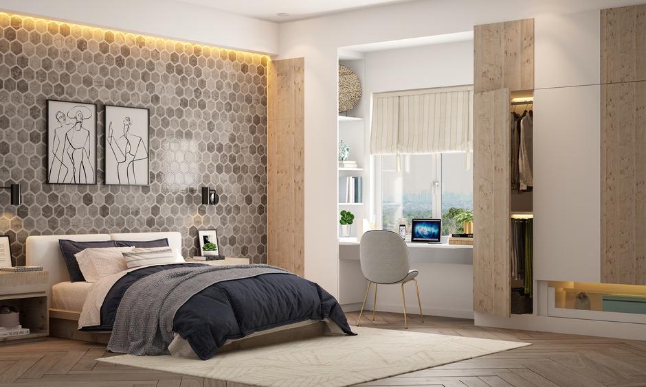Modern bedroom with hexagon grey wall tiles and a contrasting wooden floor tile design