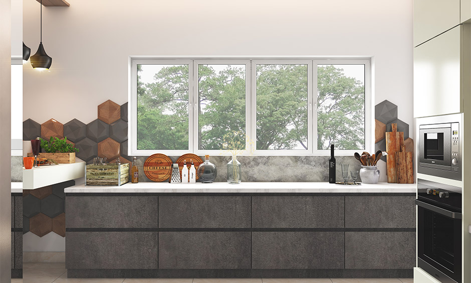 Wet and dry kitchen design with warm materials, built-in appliances, versatile island, and layered lighting for ambience.