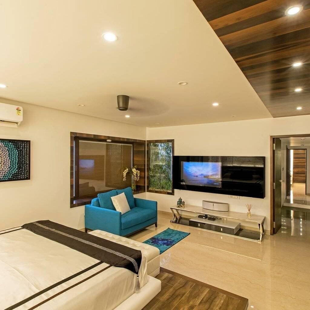 Wooden false ceiling design for bedroom which brings warmth and class to the space